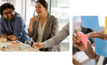 Three colleagues sharing a meal together and someone sticking a Post it note on a window.