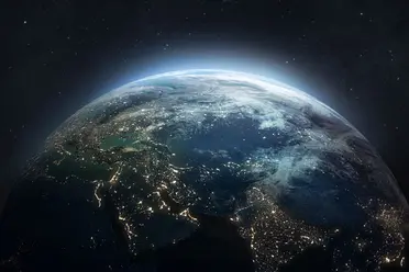 Meeting global carbon budget goals with sustainable travel