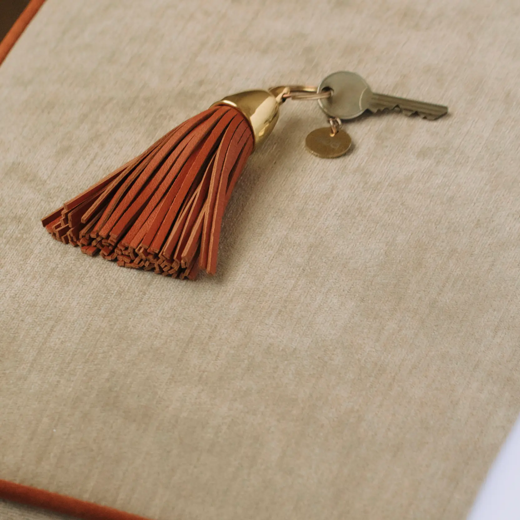 Hotel Room Key On Beautiful Fabric