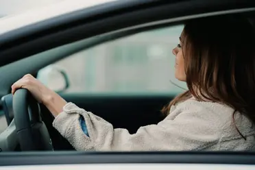 Woman Driving Car Jenny Ueberberg jI6rCVv9IFk Unsplash