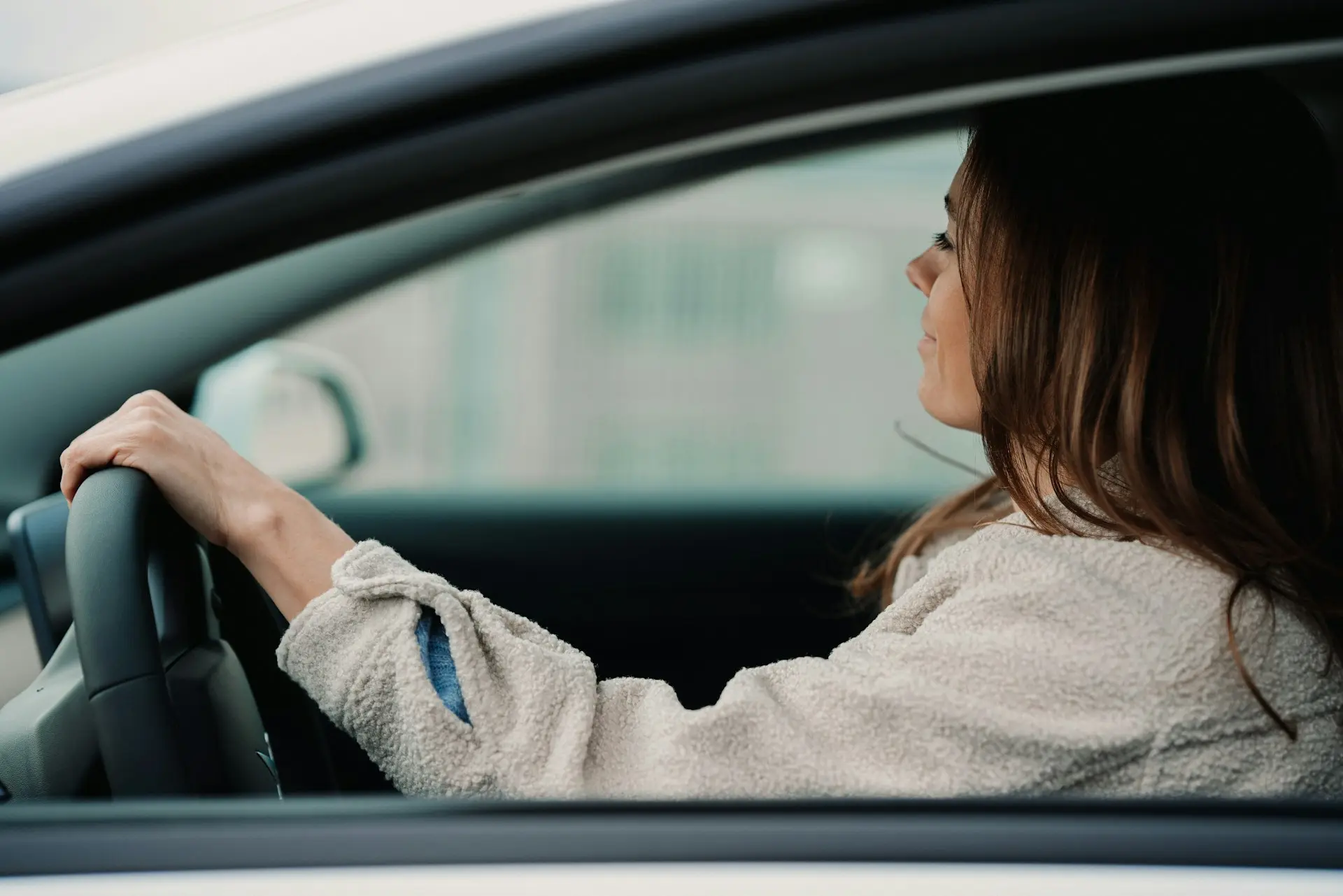 Woman Driving Car Jenny Ueberberg jI6rCVv9IFk Unsplash