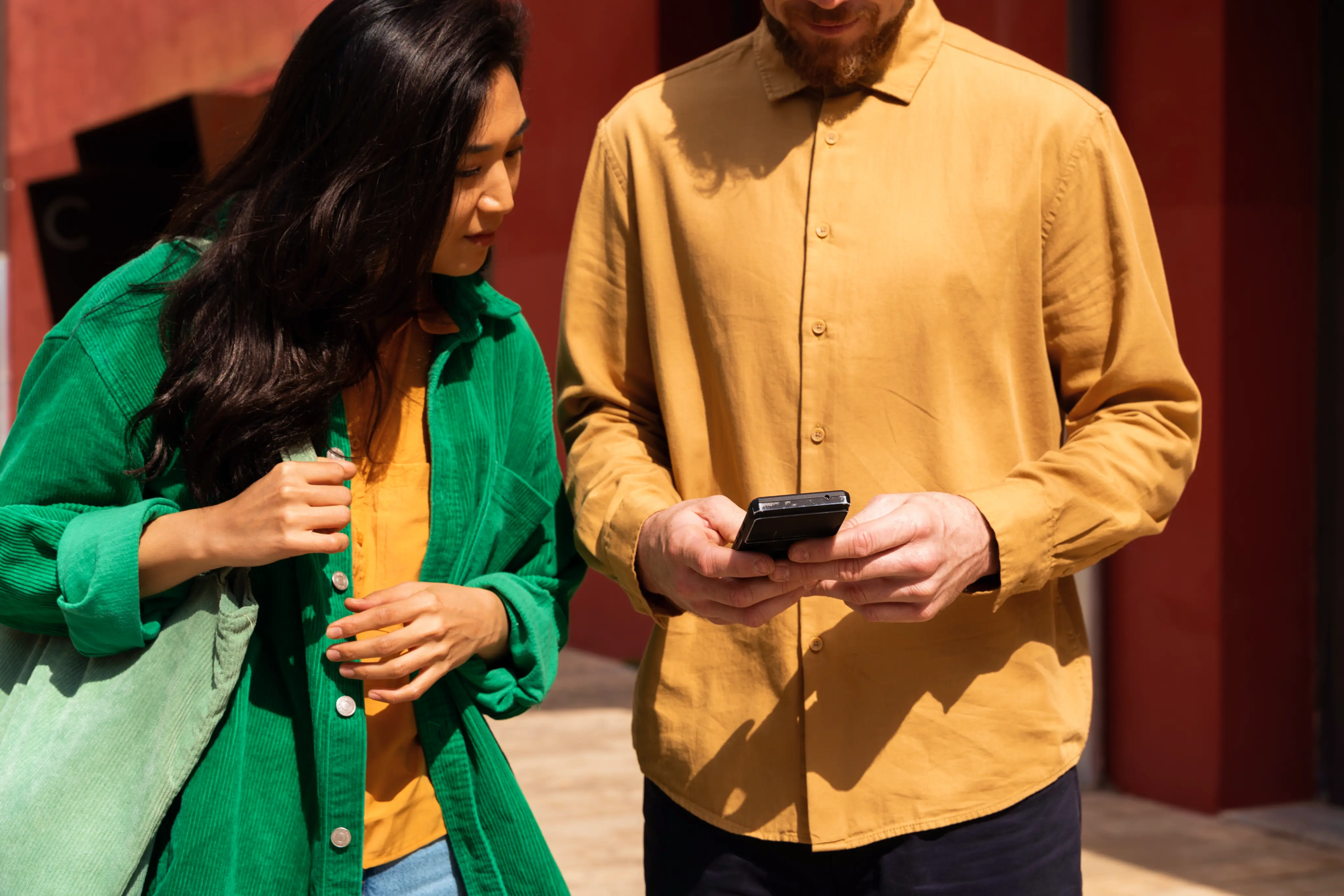 Happy Coworkers With Phone Outdoors