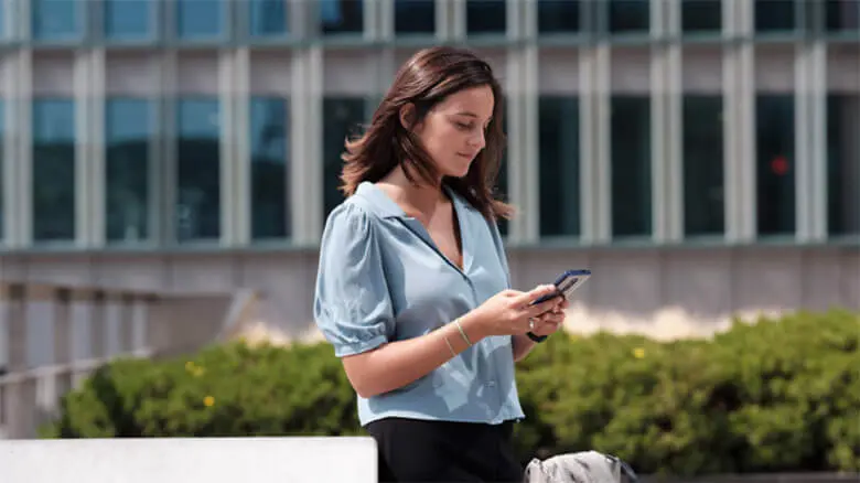 Woman Outdoors With Phone 780x438 1
