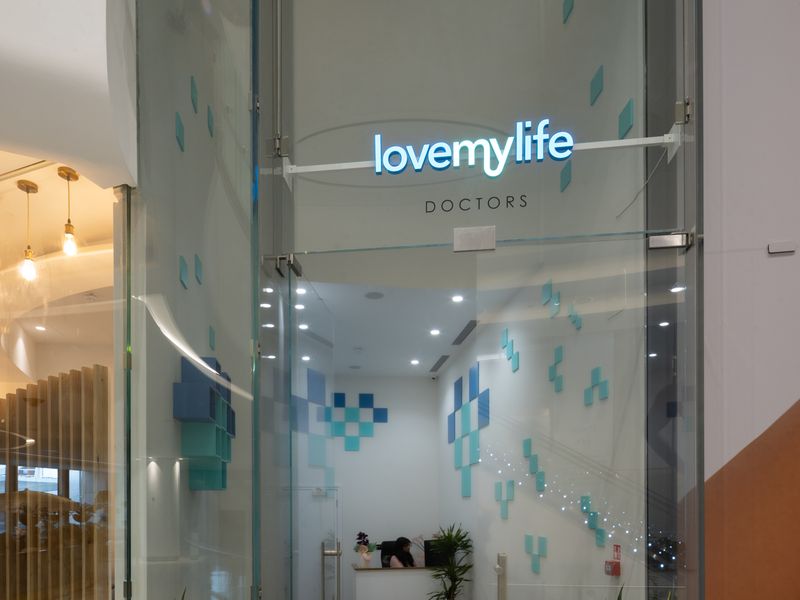 The LoveMyLife clinic entrance with its tall sign, The Village, Westfield London