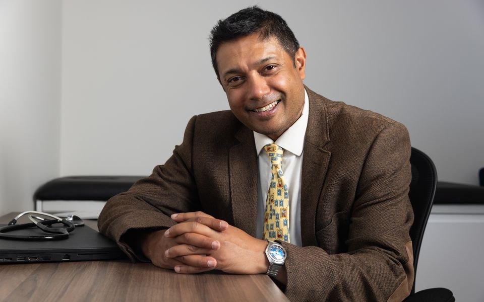 One of our doctors at his consultation desk in the LoveMyLife clinic