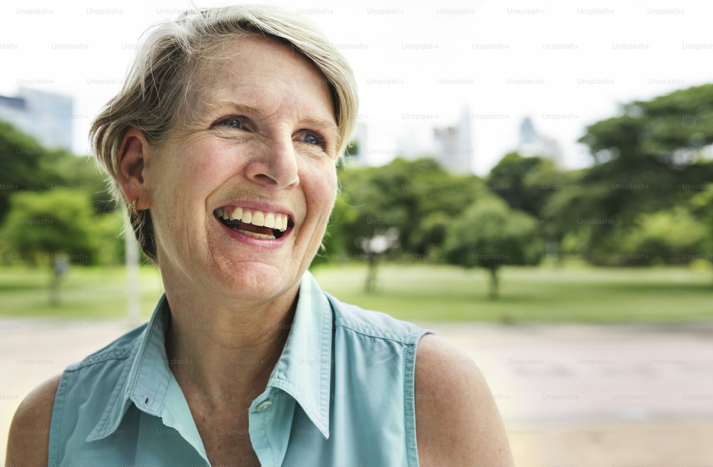 A smiling woman in her fifties