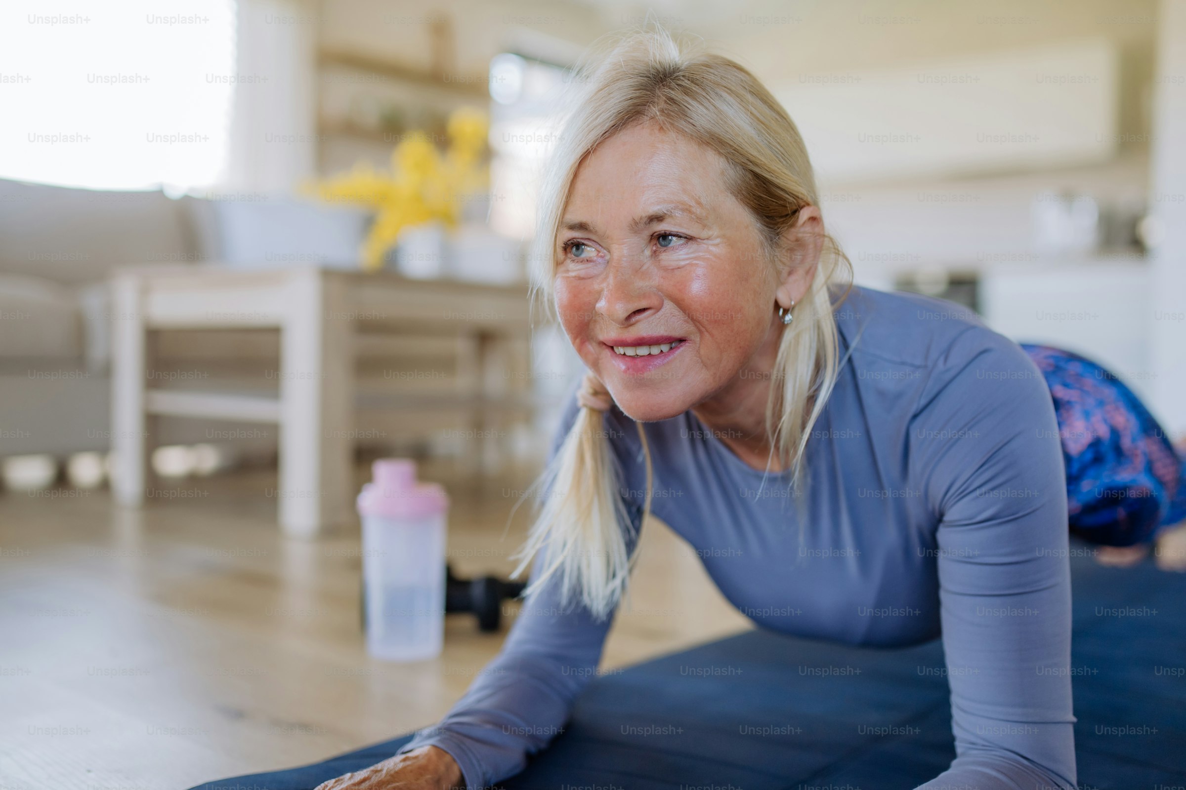 A fit older woman exercising