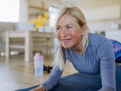 A fit older woman exercising