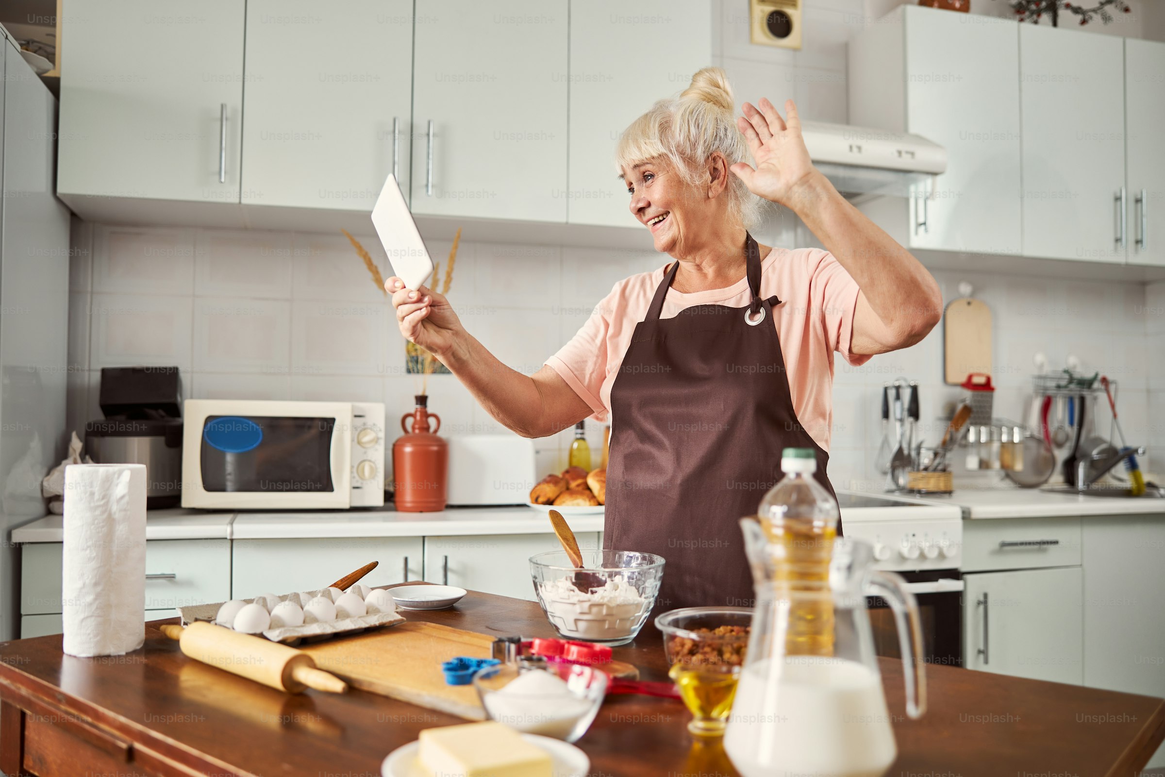 A smiling woman in her fifties