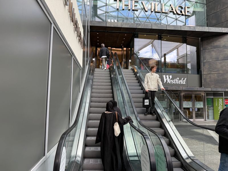 Escalators leading up to The Village entrance