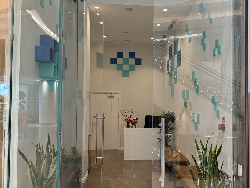 The LoveMyLife clinic entrance with the doors open onto reception