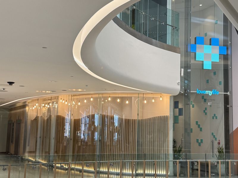 The LoveMyLife clinic frontage at The Village, Westfield London, seen across the upper atrium