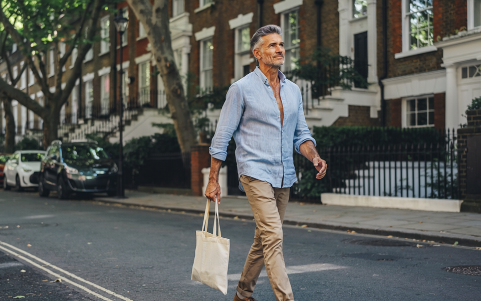 A leafy residential London street on a sunny weekday morning.