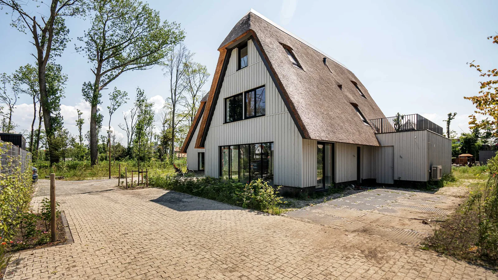 25 rietgedekte villa's 'Eilanden Oost' Muiden Lichtenberg Bouwgroep