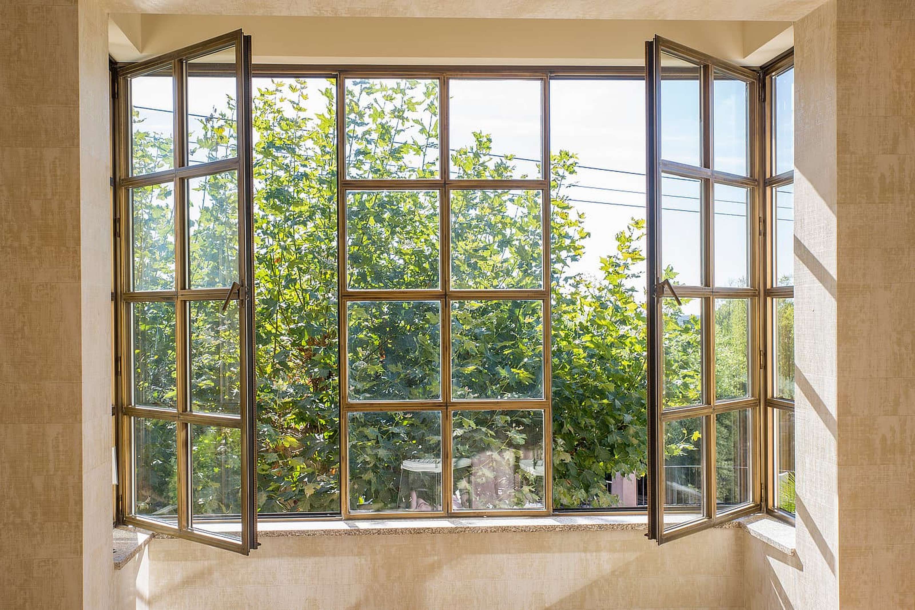 A external slimline steel window supplied by Fluid Glass in the UK
