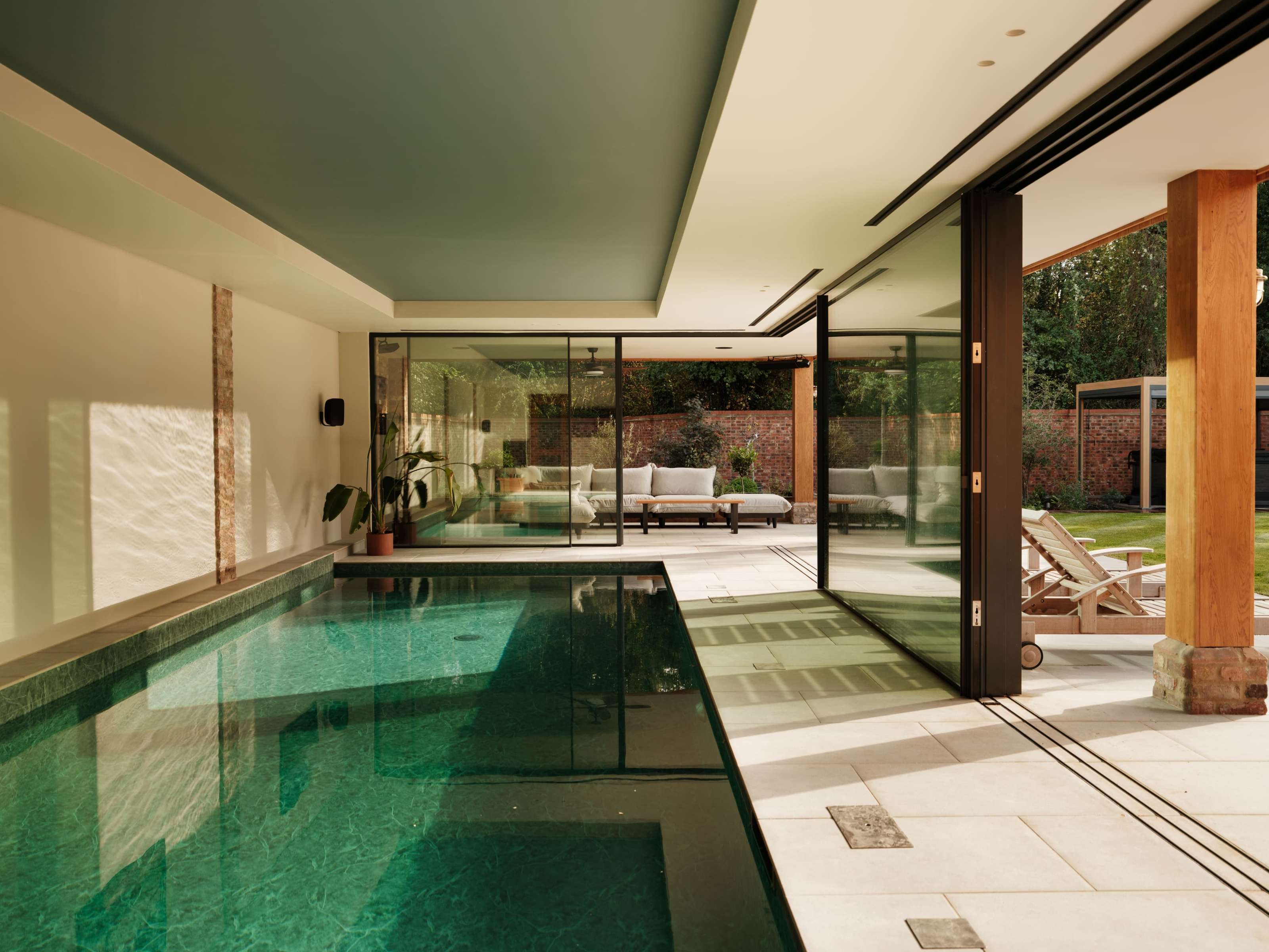 External pocket sliding doors at Foxglove, a SIPs home in Buckinghamshire: triple-glazed panels