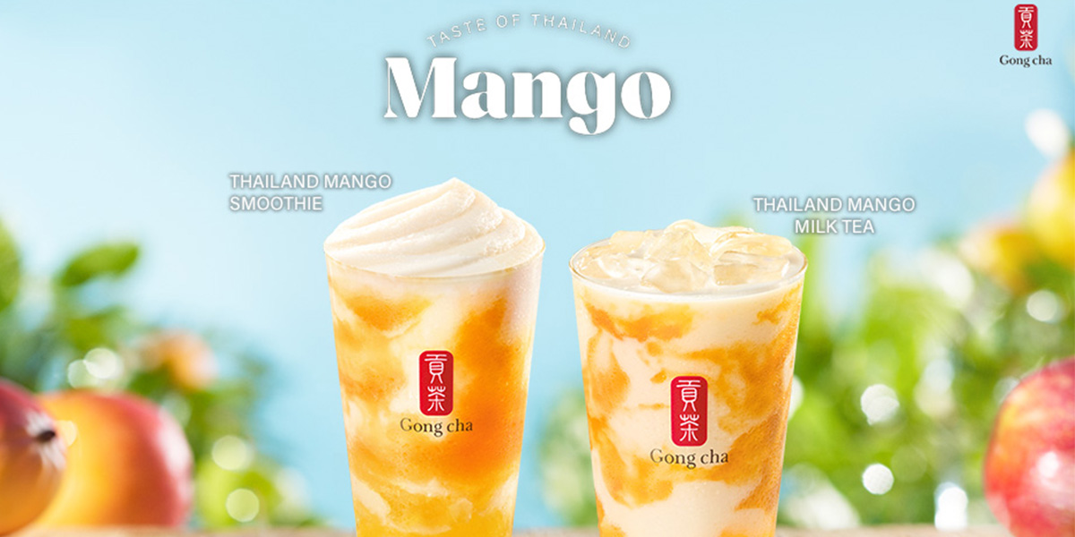 Two Gong Cha mango drinks on a sunny backdrop: Thailand Mango Smoothie (left) and Thailand Mango Milk Tea (right) with swirls of mango.