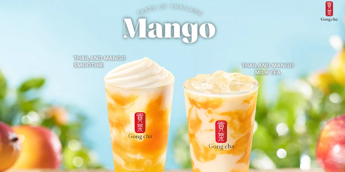 Two Gong Cha mango drinks on a sunny backdrop: Thailand Mango Smoothie (left) and Thailand Mango Milk Tea (right) with swirls of mango.