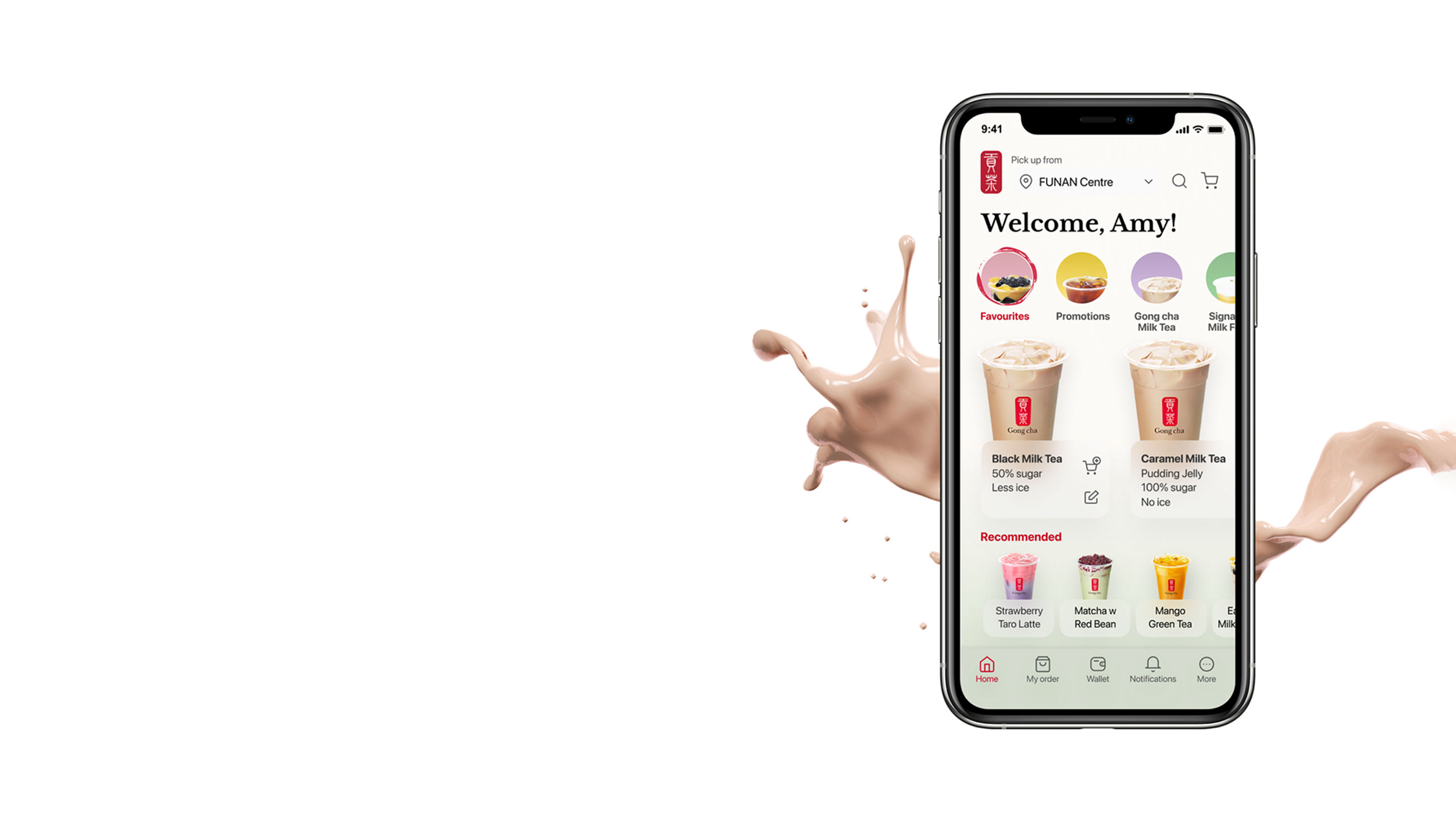 Smartphone displaying bubble tea app with drink options and splashes of milk tea in the background.