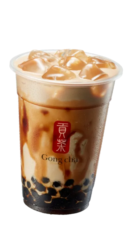 Cup of iced bubble tea from Gong Cha with signature pearls and a creamy, swirled appearance.