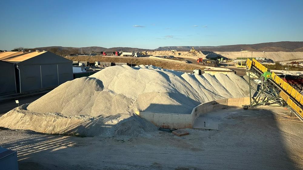 Spodumene concentrate 5% stockpile. The visit showed active trucking activity both at the mine site and transport to port.