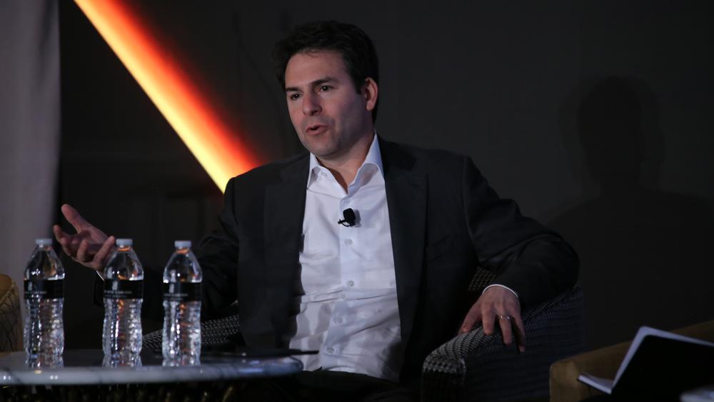 James Litinsky CEO and founder of MP materials rare earth producer on stage at Benchmark Week