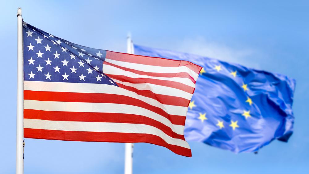 US and EU flags flying one in front of the other