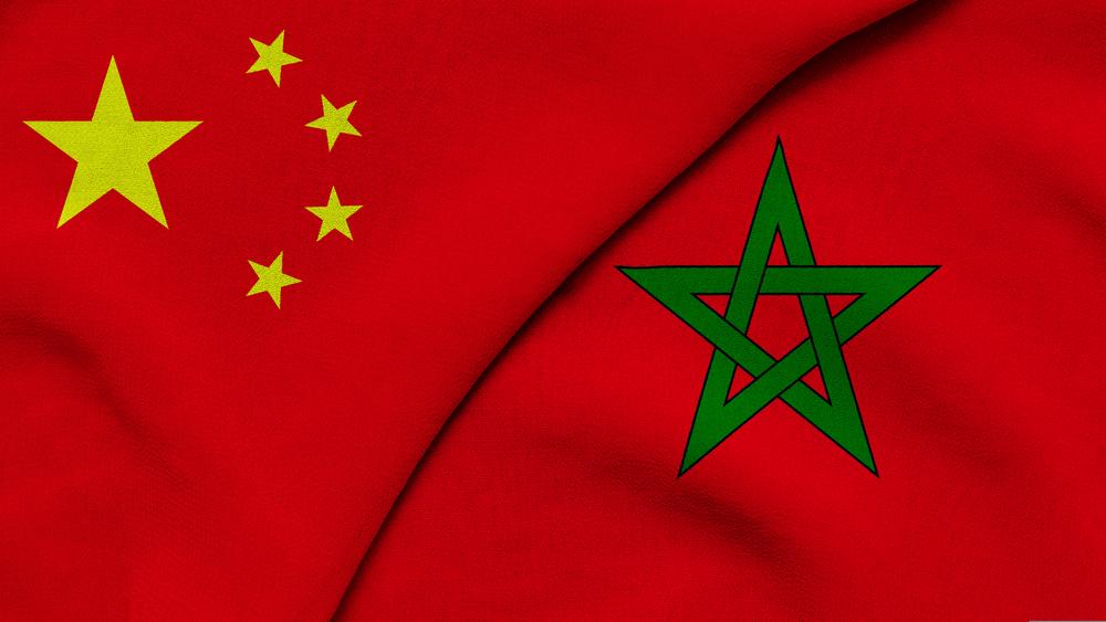 Chinese and Moroccan flag taking up diagonal halves of the image