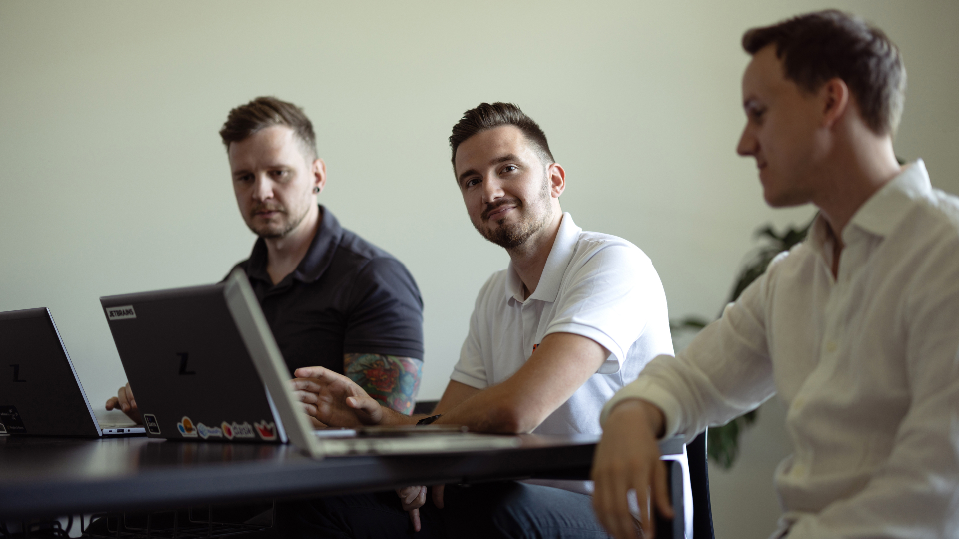 Two Data scientists are validating data while the digital business analyst is thinking.