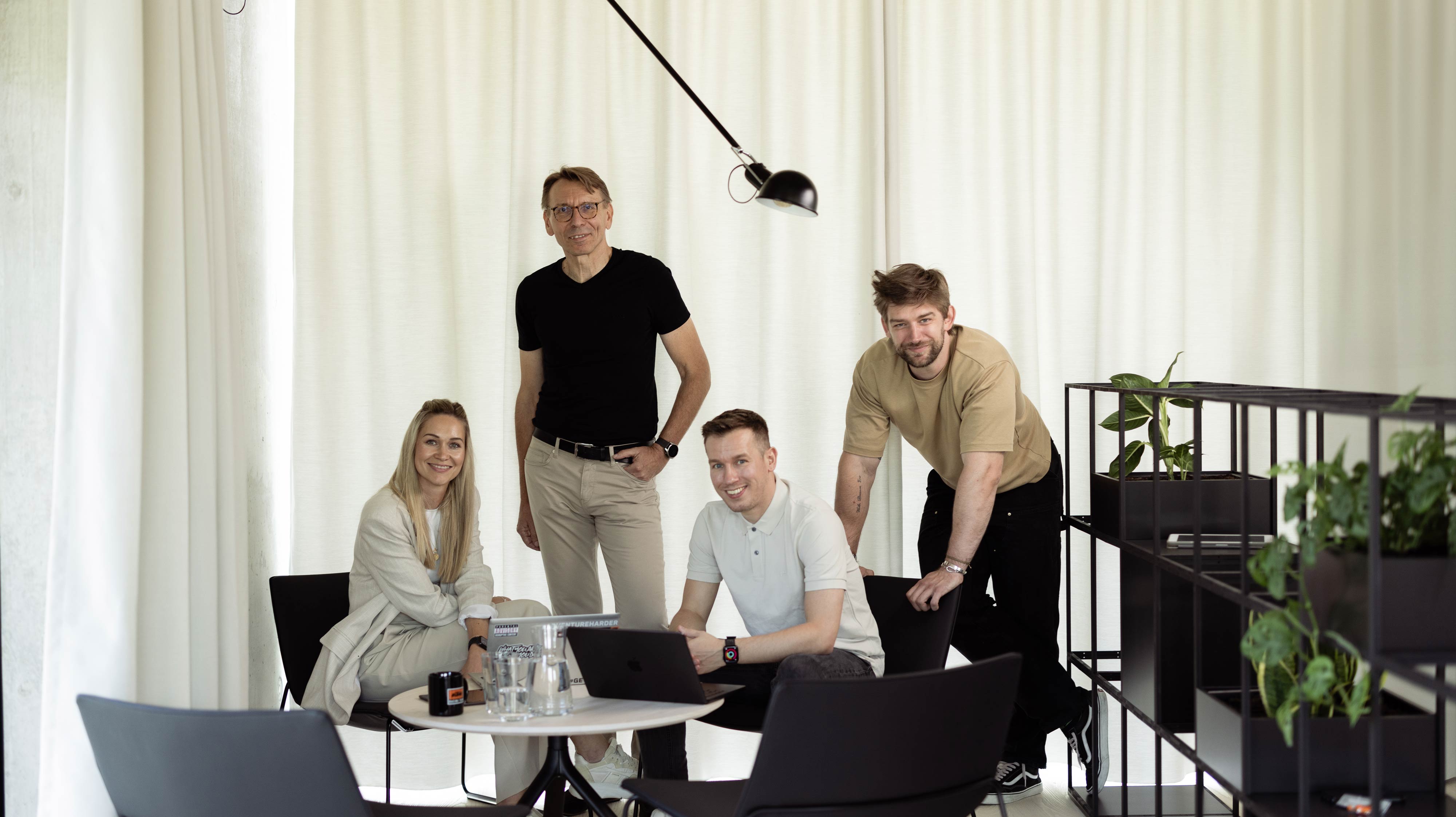 Four innovation consultants discussing the future.