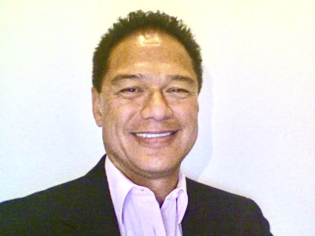 Headshot of John Tilton