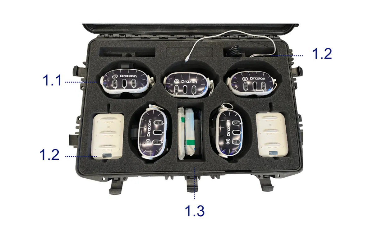Inside the Draxon VR case showing headset compartments, charging setup, and accessories
