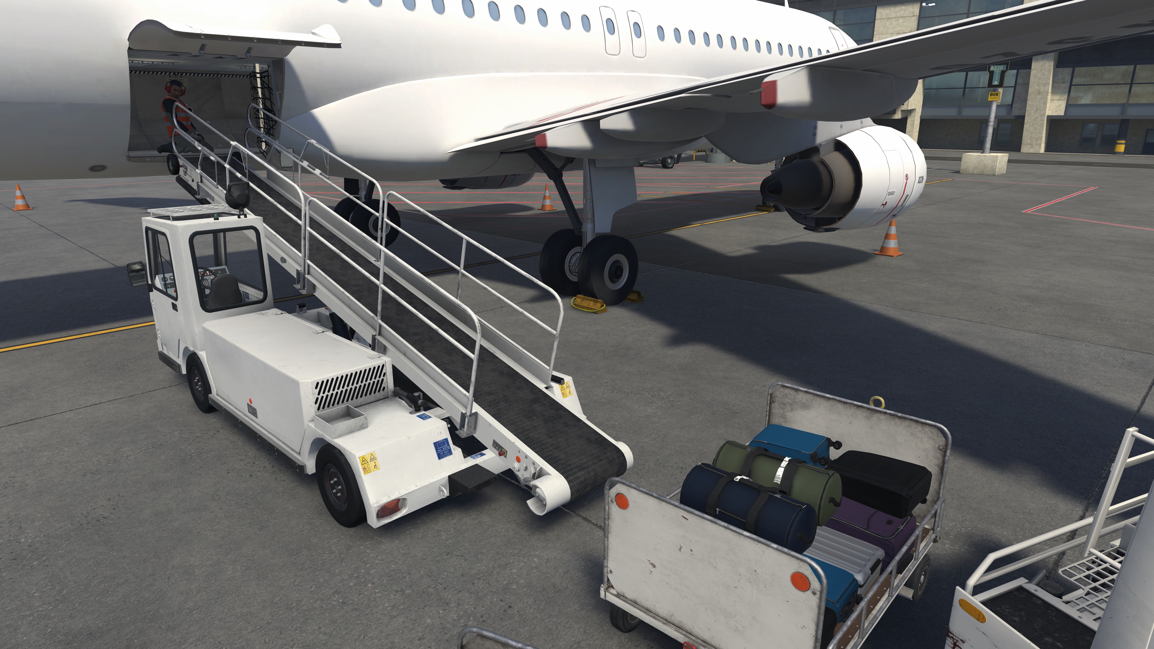 Loading baggage at the belt loader base