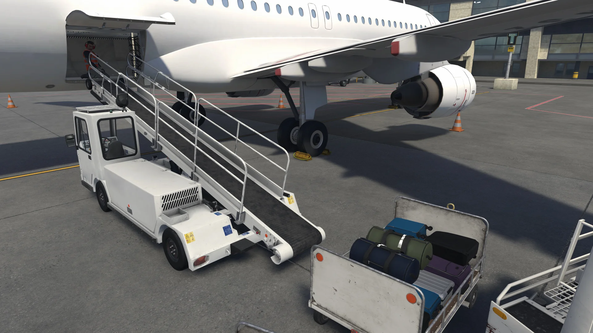 Loading baggage at the belt loader base