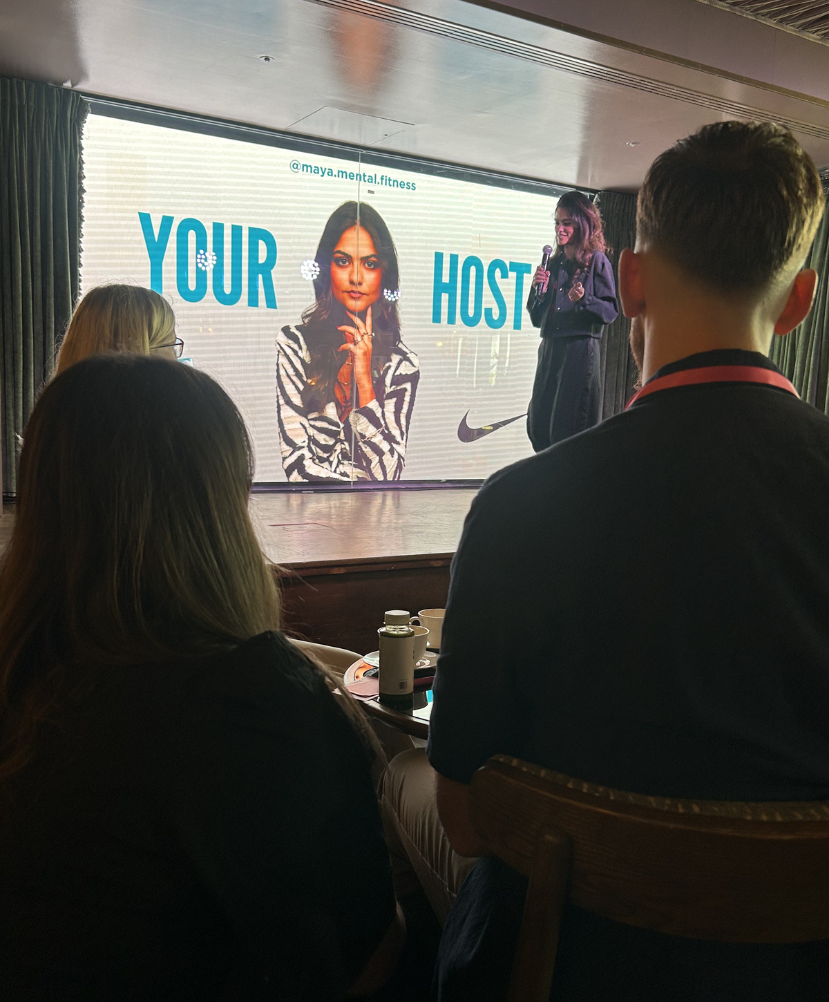 A speaker on stage at the Performance Marketing Awards Finalists' Brunch