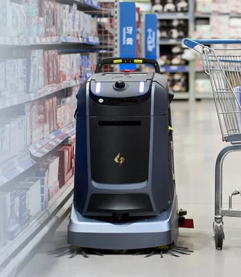 Rengøringsrobot Mira fra robotverden set i supermarked og gør rent