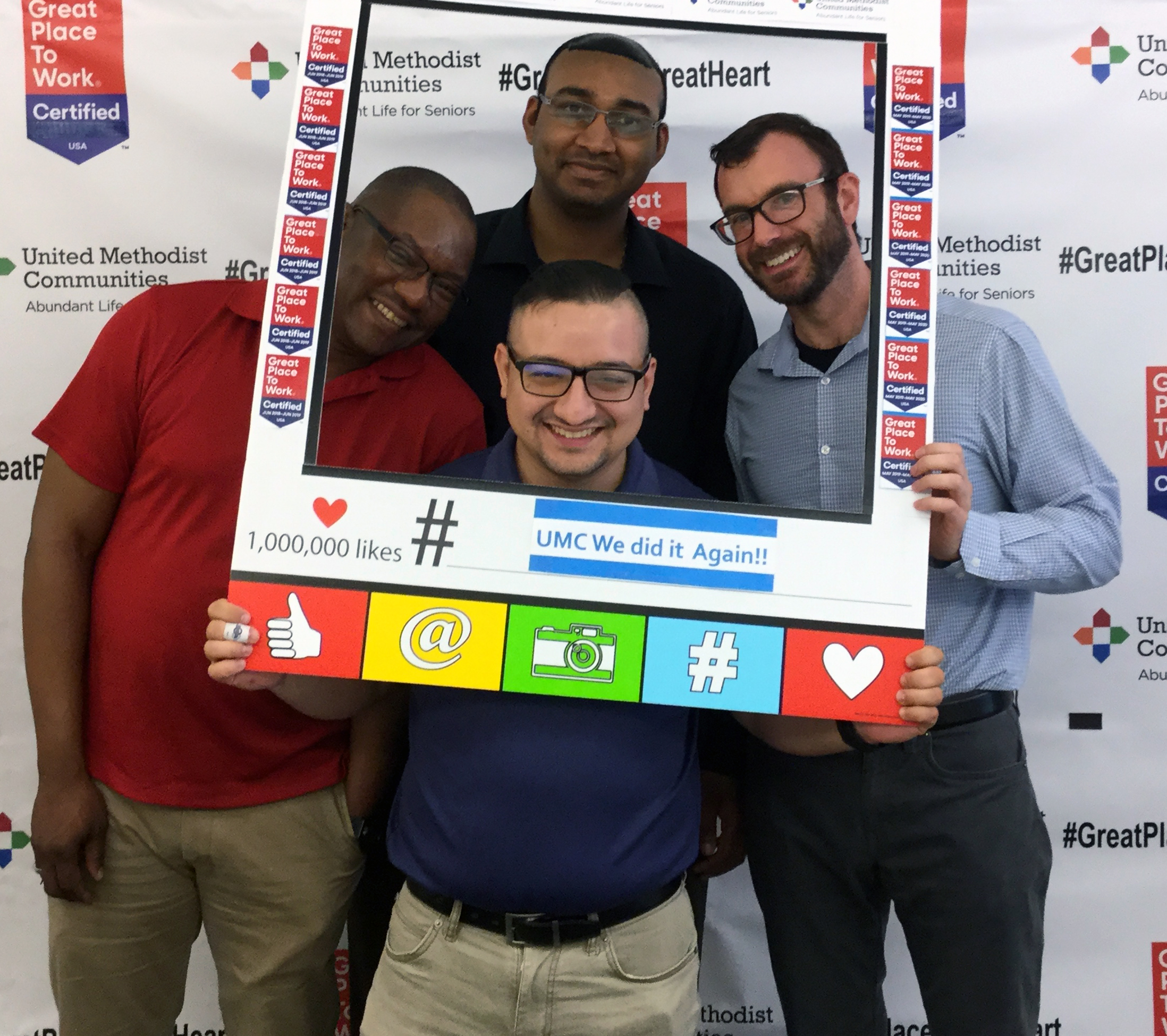 The IT team takes time from all things digital to celebrate UMC’s achievement.