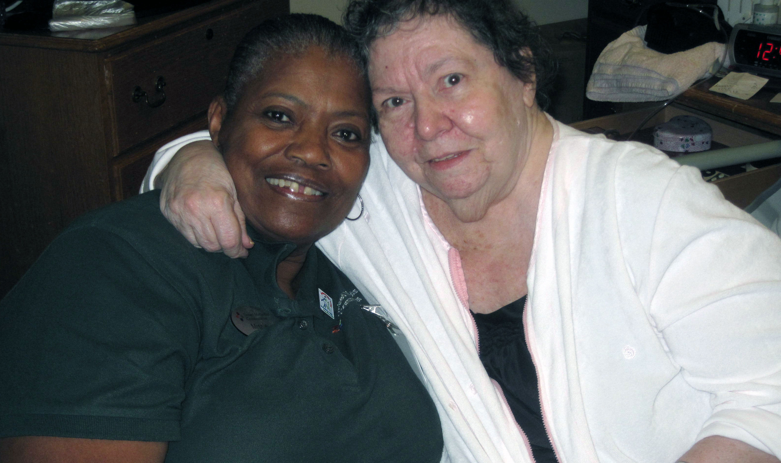 Associate, Missie Taylor, with resident, Shirley.
