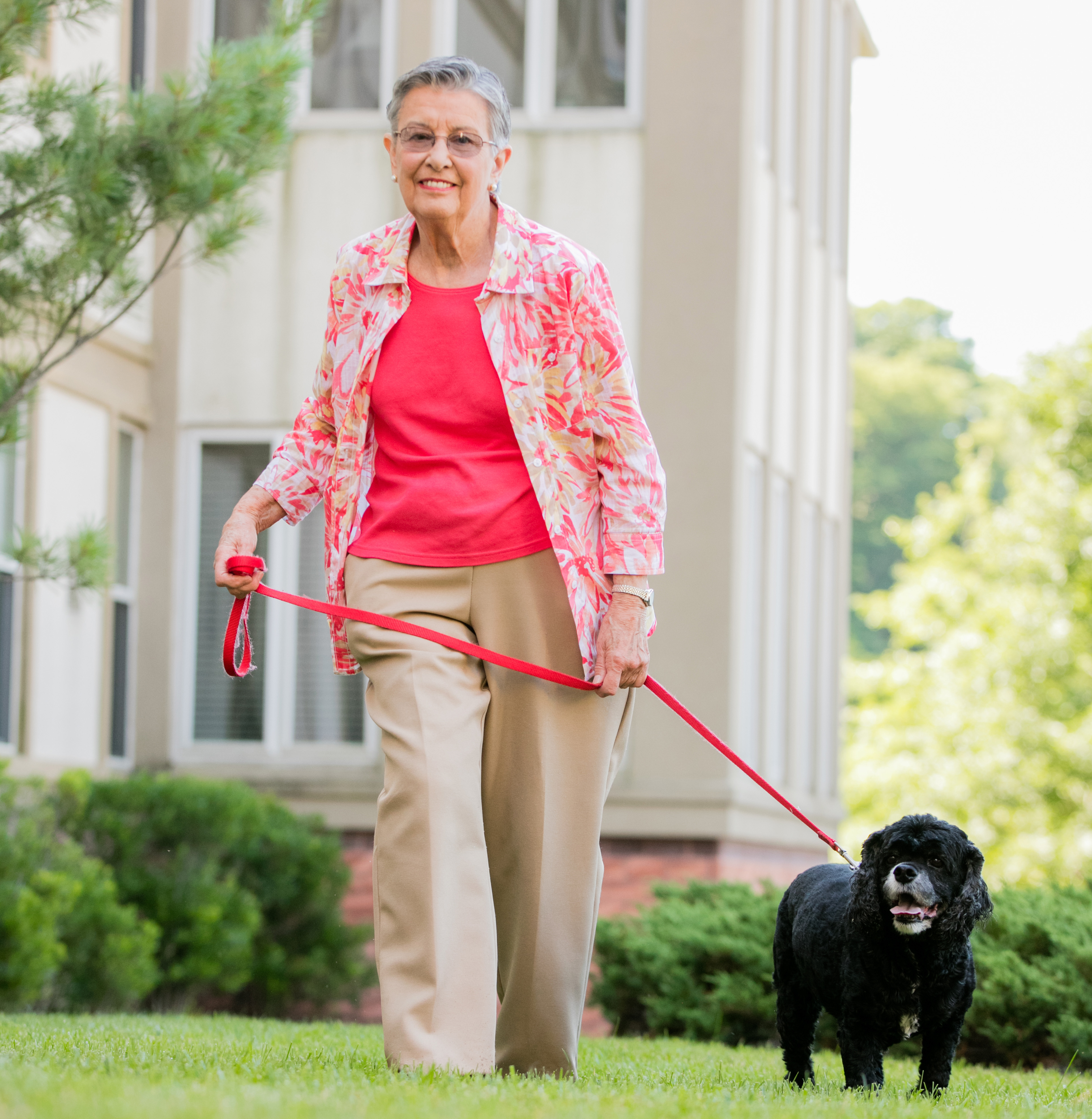 resident walking dog