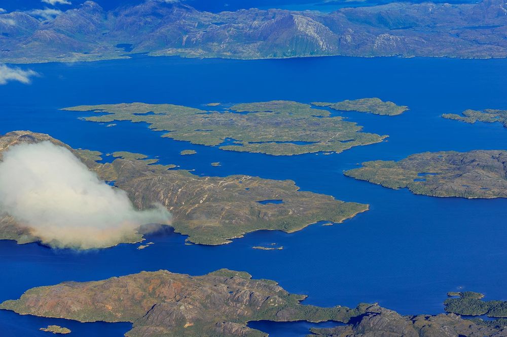 Aerial view of pristine blue lakes and forested islands in Patagonia National Park along the Carretera Austral, southern Chile.