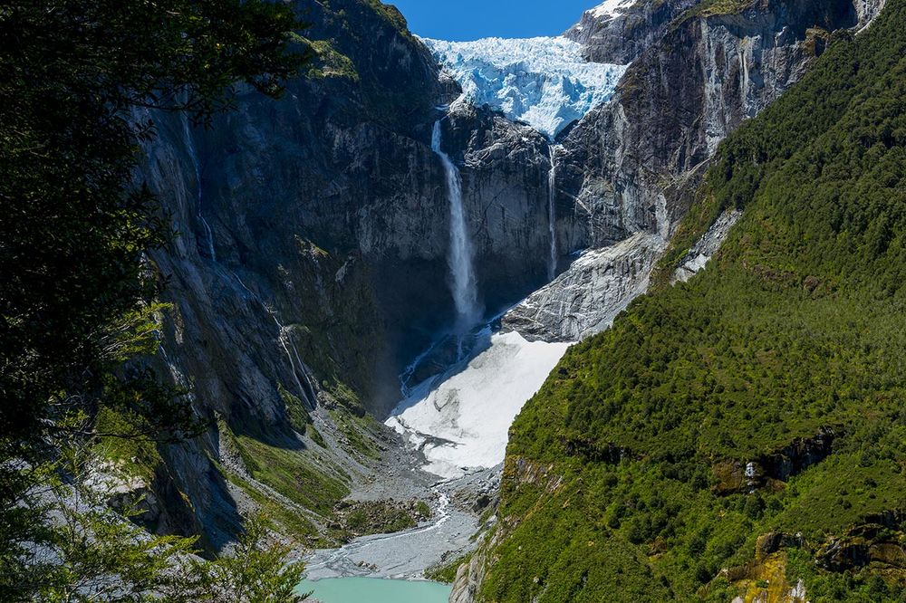 Ventisquero Colgante glacier cascades down steep cliffs in Queulat National Park along the Carretera Austral.