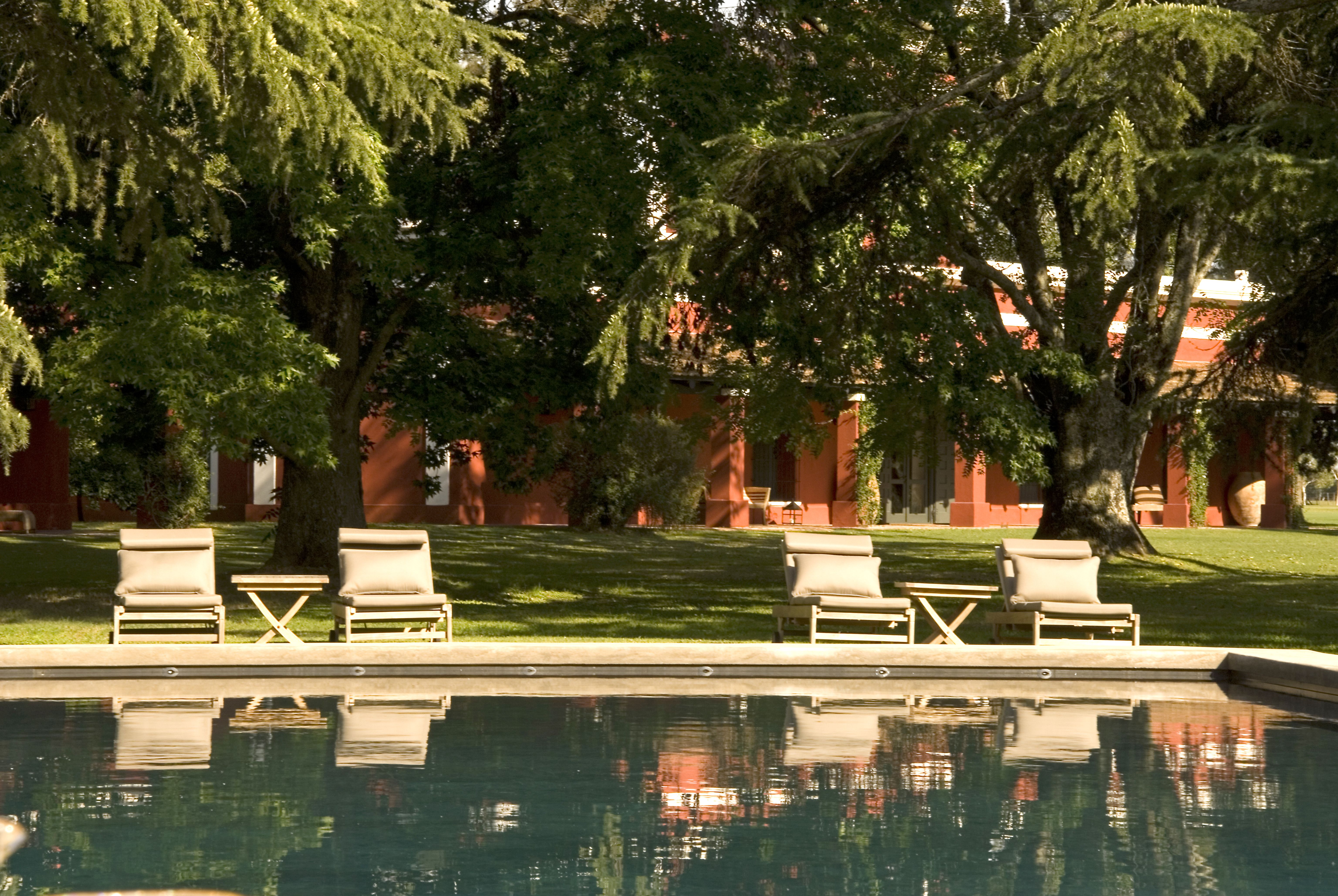 Poolside lounge at an estancia near Buenos Aires, an example of tailor-made Argentina trip design