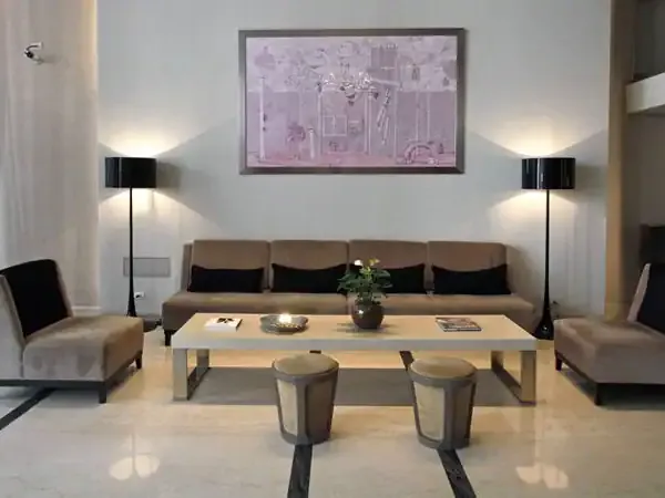 Modern luxury living room in Buenos Aires Recoleta district featuring contemporary furnishings and minimalist design.
