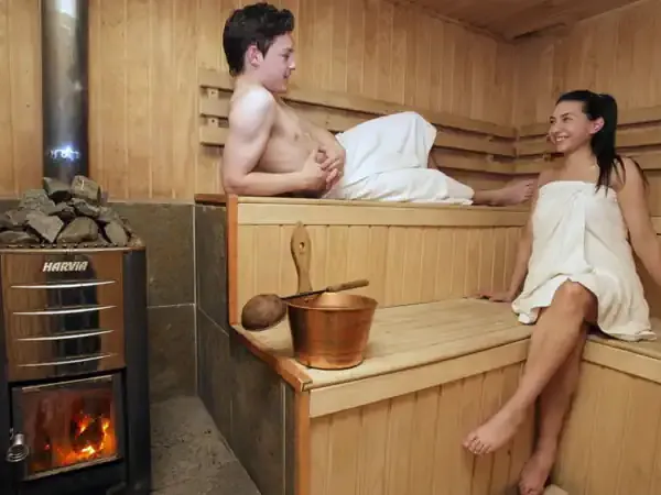 Visitors enjoy a traditional wood-fired sauna at Hotel Las Torres in Patagonia.