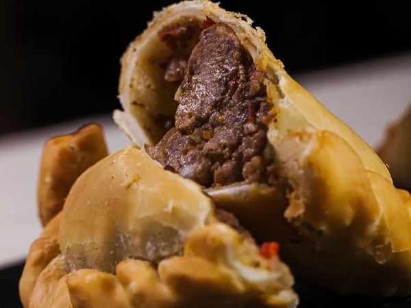 Savory Argentine empanada filled with seasoned ground beef, a traditional Buenos Aires specialty.