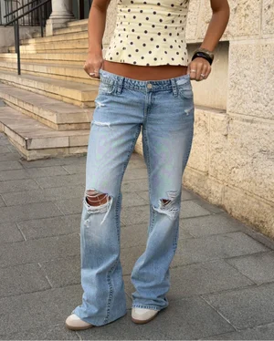 Baggy jeans with a loose fit.