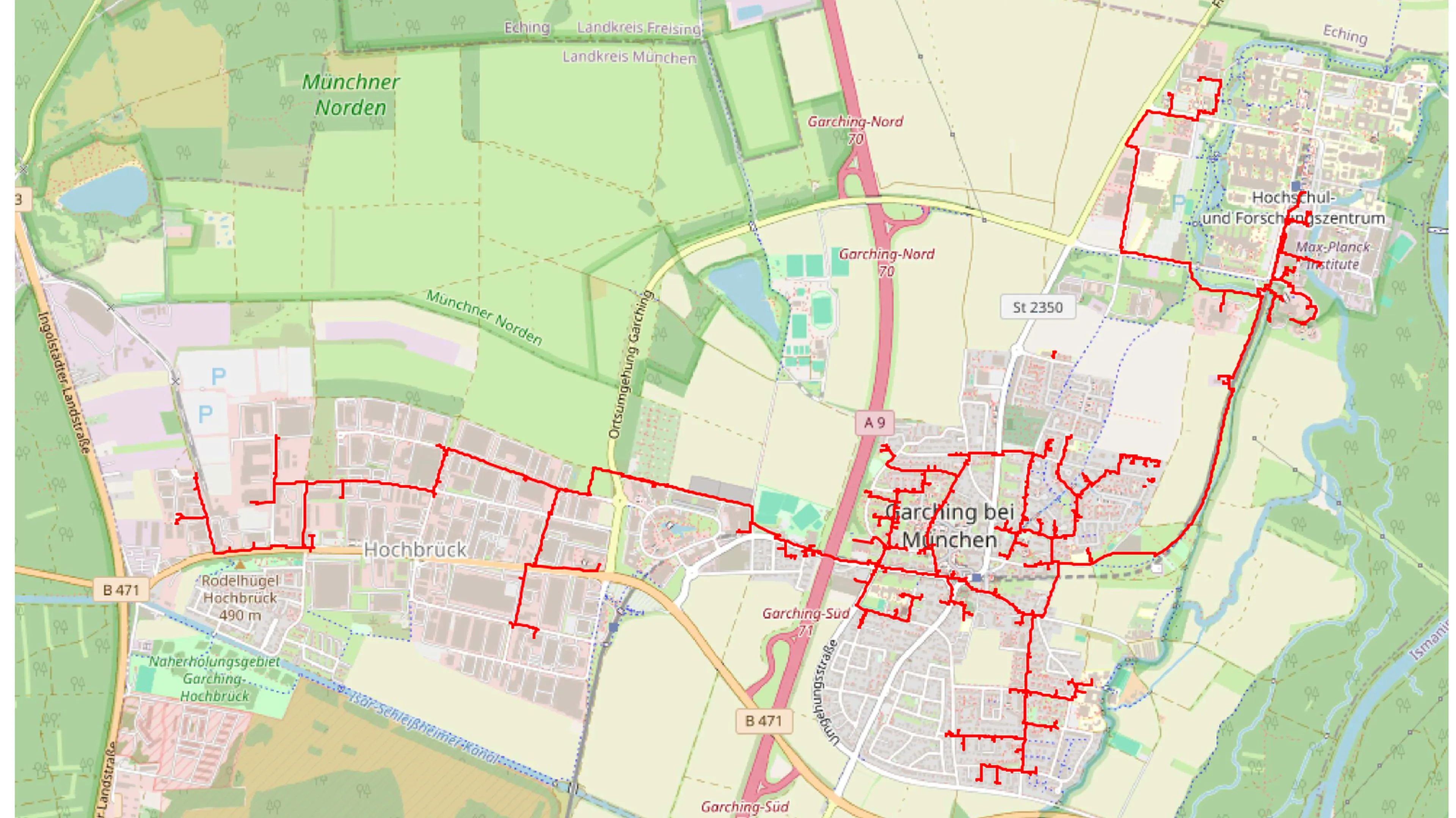 Map featuring a red line tracing a route through a city and suburban area, with green spaces and roads labeled Hochbrück and Garching.