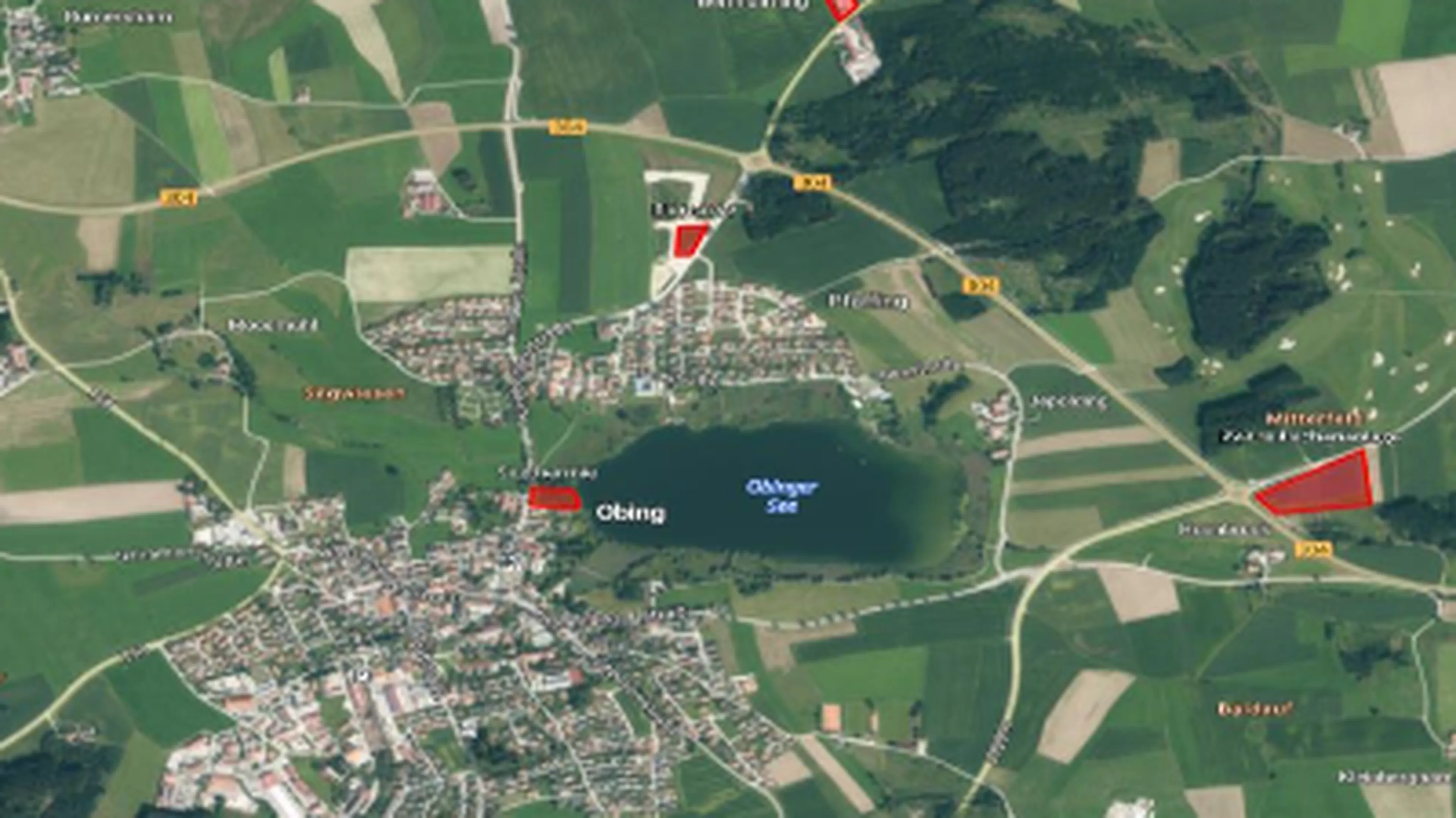 Aerial view of a rural landscape with Obinger See lake, surrounded by fields, roads, and buildings labeled in a mix of black and red text.