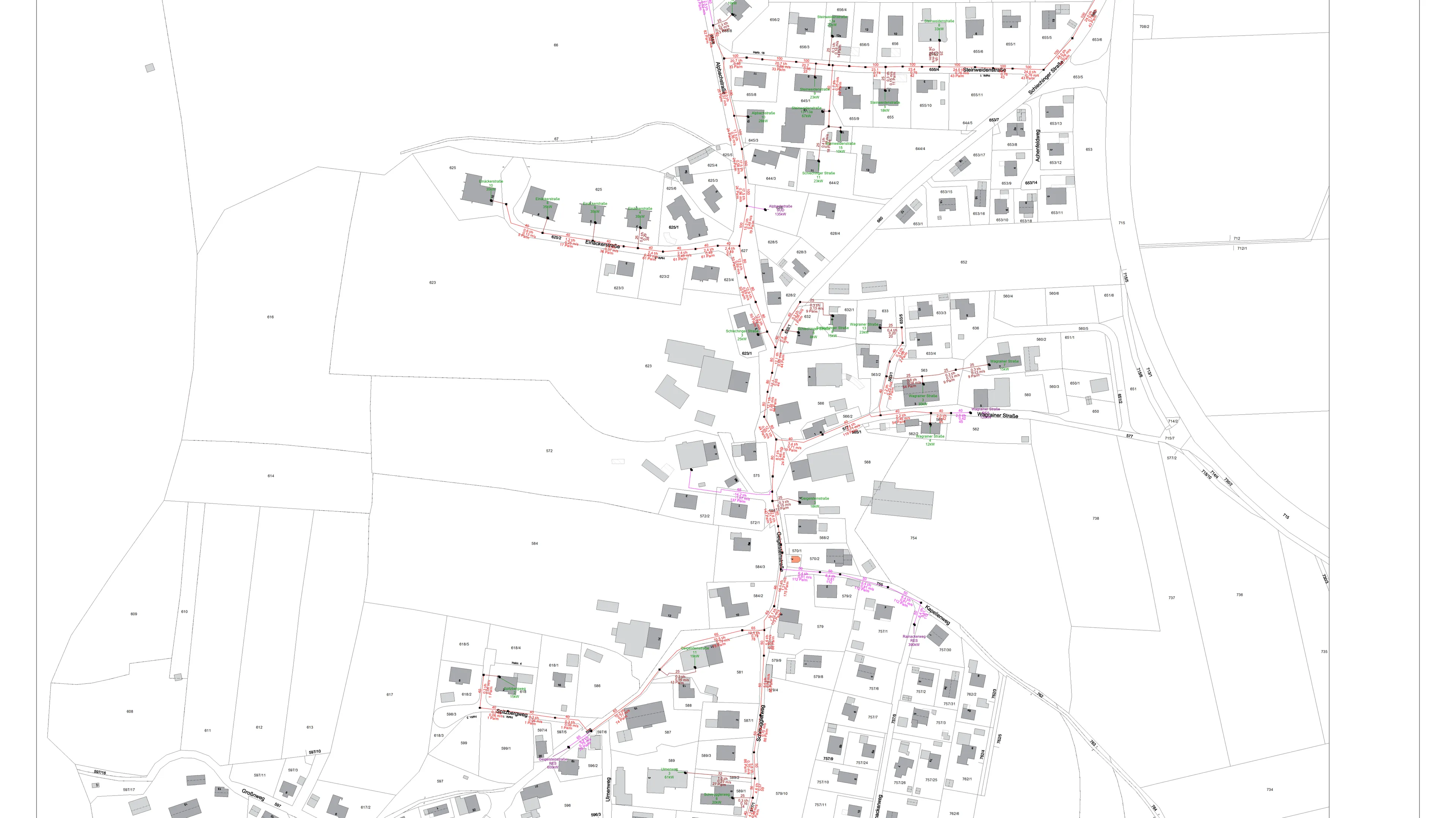 Detailed map of a rural area showing buildings, roads, and fields. Houses are clustered along a main road that runs through the center.