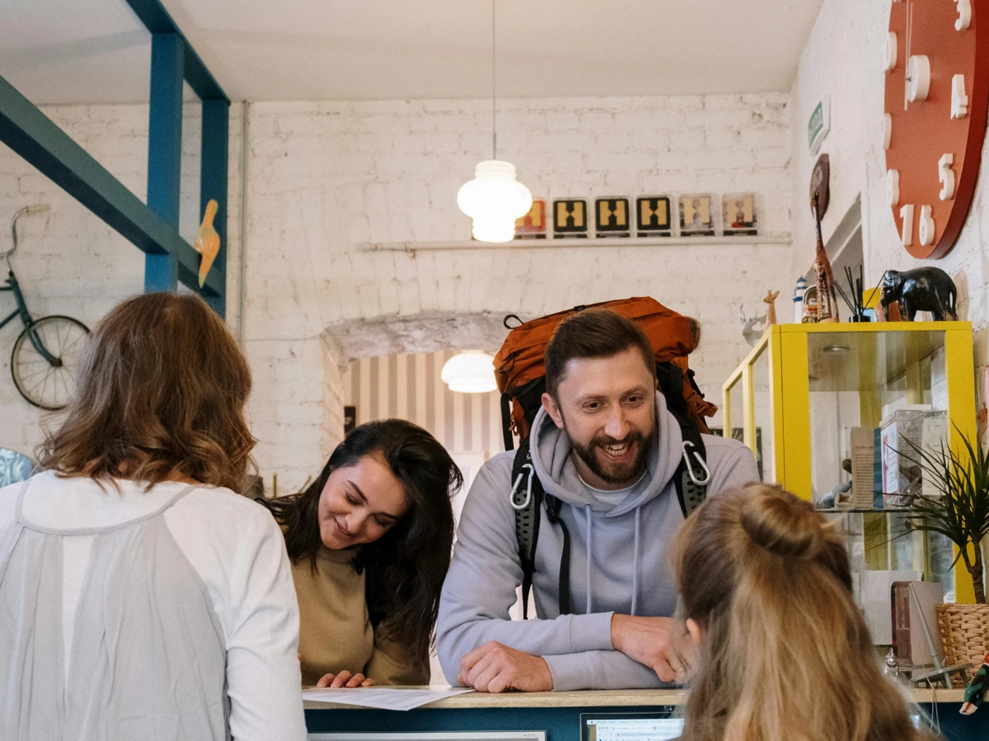 Guests at front desk of hotel